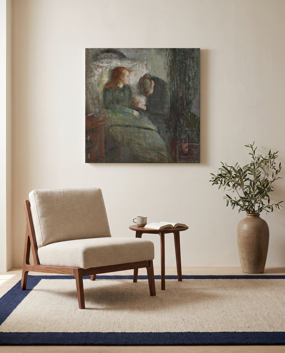The Sick Child by Edvard Munch as a stretched canvas above a linen lounge chair in a reading corner