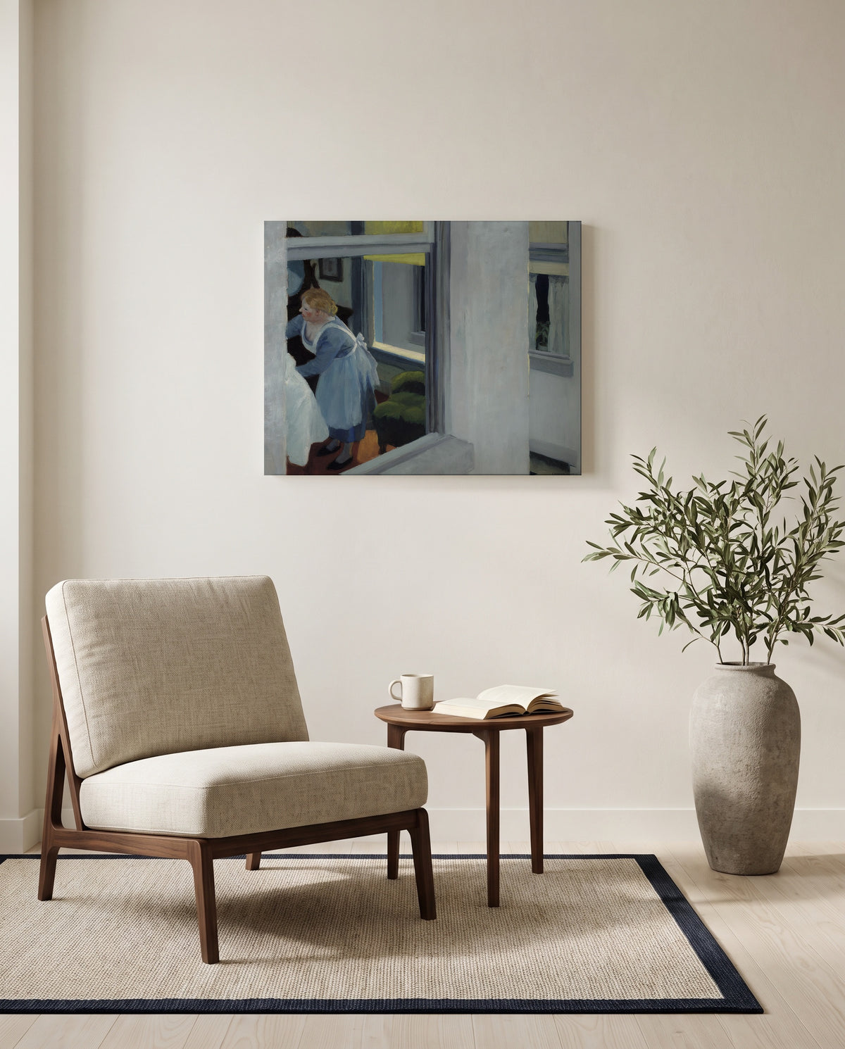 Apartment Houses by Edward Hopper as a stretched canvas above a linen lounge chair in a reading corner