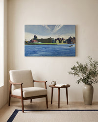Blackwell’s Island by Edward Hopper as a stretched canvas above a linen lounge chair in a reading corner