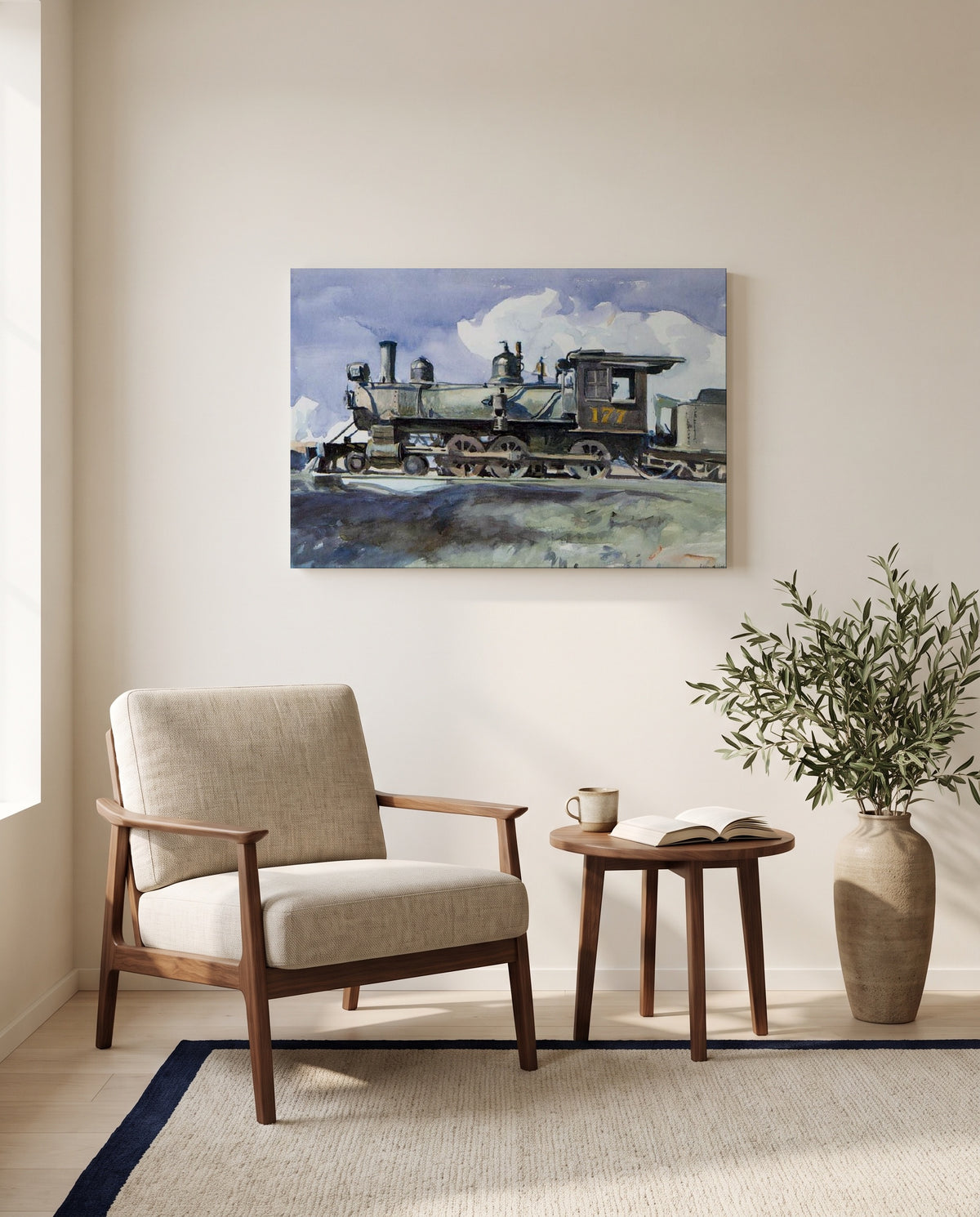 D. & R.G. Locomotive by Edward Hopper as a stretched canvas above a linen lounge chair in a reading corner