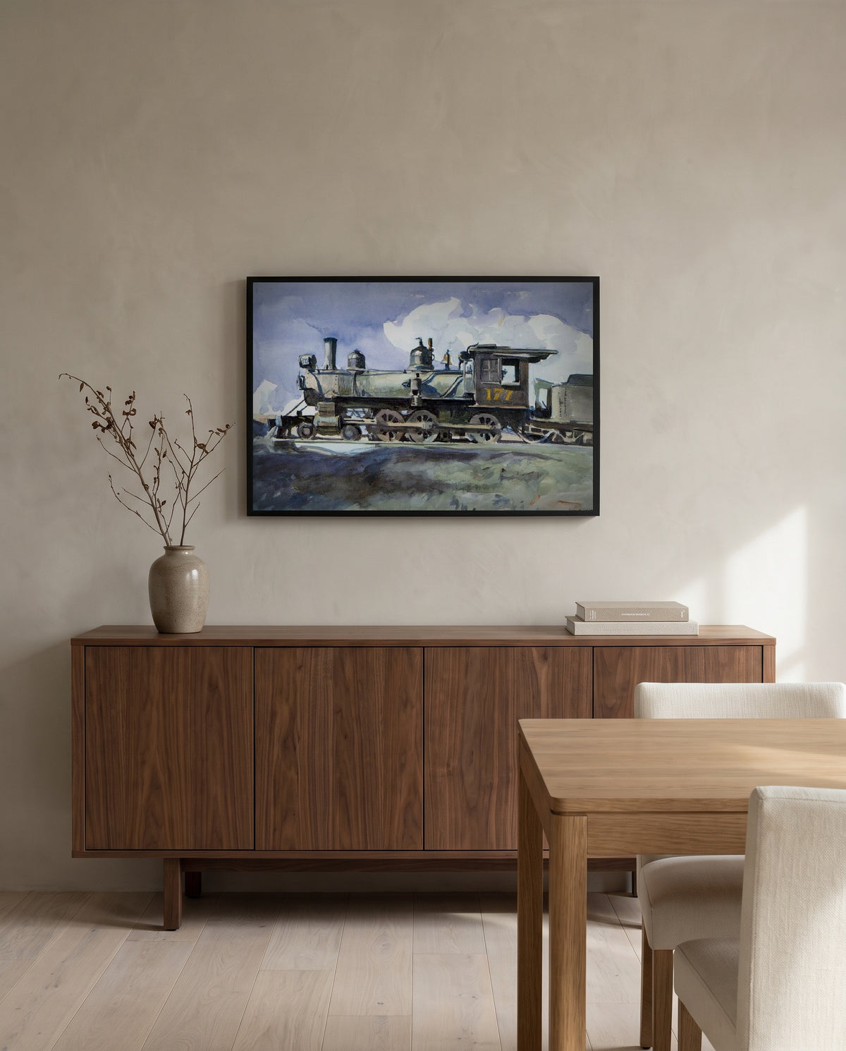 D. & R.G. Locomotive by Edward Hopper in a black frame above a walnut sideboard in a dining room