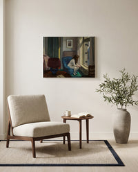 Eleven A.M. by Edward Hopper as a stretched canvas above a linen lounge chair in a reading corner