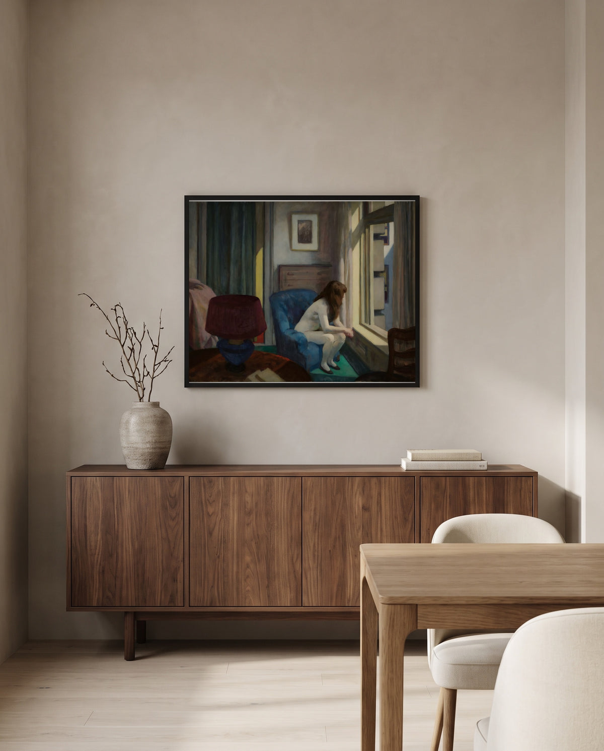 Eleven A.M. by Edward Hopper in a black frame above a walnut sideboard in a dining room