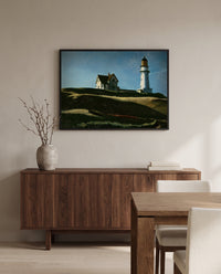 Lighthouse Hill by Edward Hopper in a black frame above a walnut sideboard in a dining room
