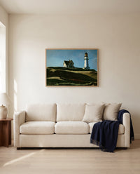Lighthouse Hill by Edward Hopper framed in natural oak above a cream sofa in a warm living room