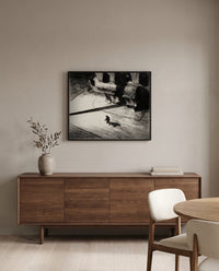 Night Shadows by Edward Hopper in a black frame above a walnut sideboard in a dining room