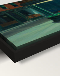 Nighthawks framed canvas, corner close-up: the canvas in a slim black floating frame, its painted edge in the shadow gap