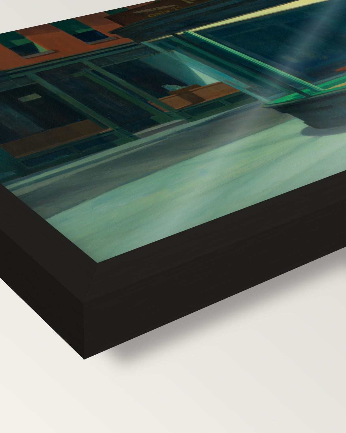 Nighthawks by Edward Hopper framed print, corner close-up: black moulding, the print edge to edge behind plexiglass, no mat