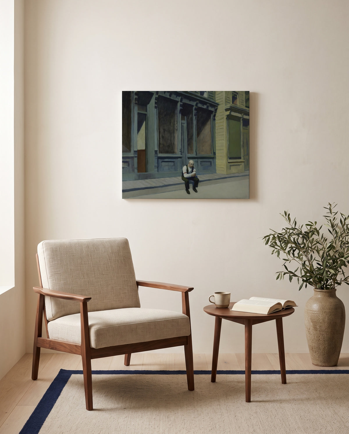 Sunday by Edward Hopper as a stretched canvas above a linen lounge chair in a reading corner