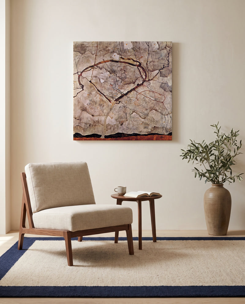 Autumn Tree in Stirred Air by Egon Schiele as a stretched canvas above a linen lounge chair in a reading corner