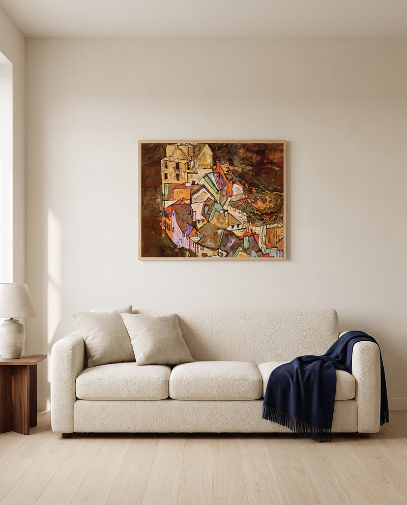 Edge of Town by Egon Schiele framed in natural oak above a cream sofa in a warm living room