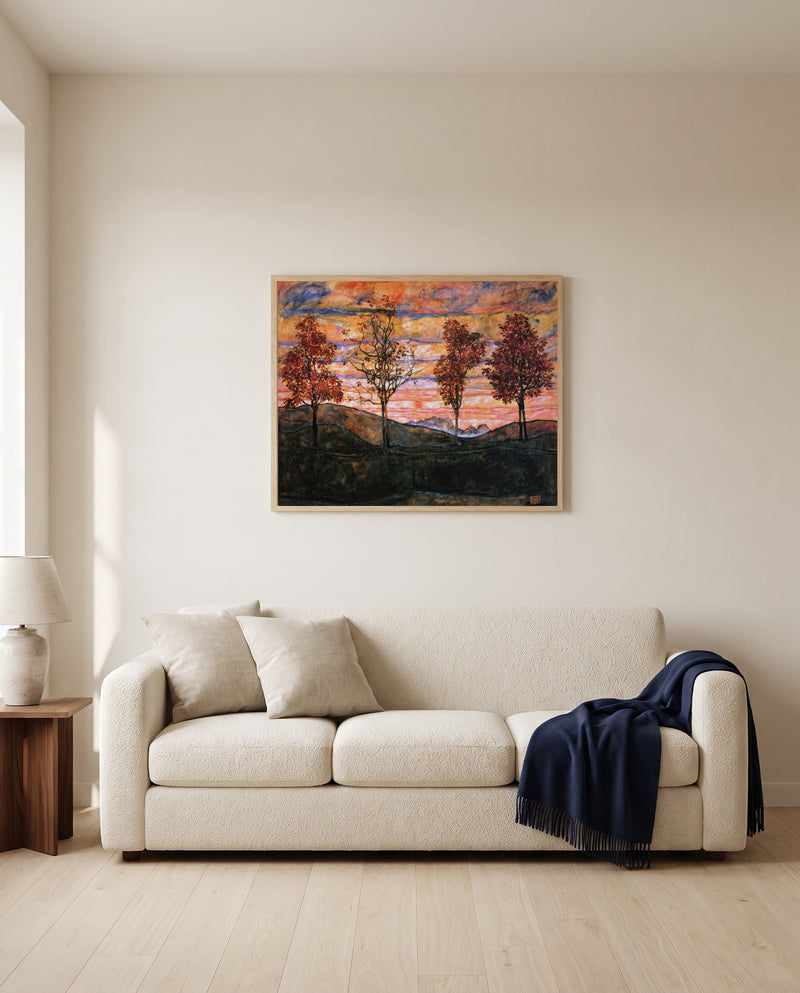 Four Trees by Egon Schiele framed in natural oak above a cream sofa in a warm living room