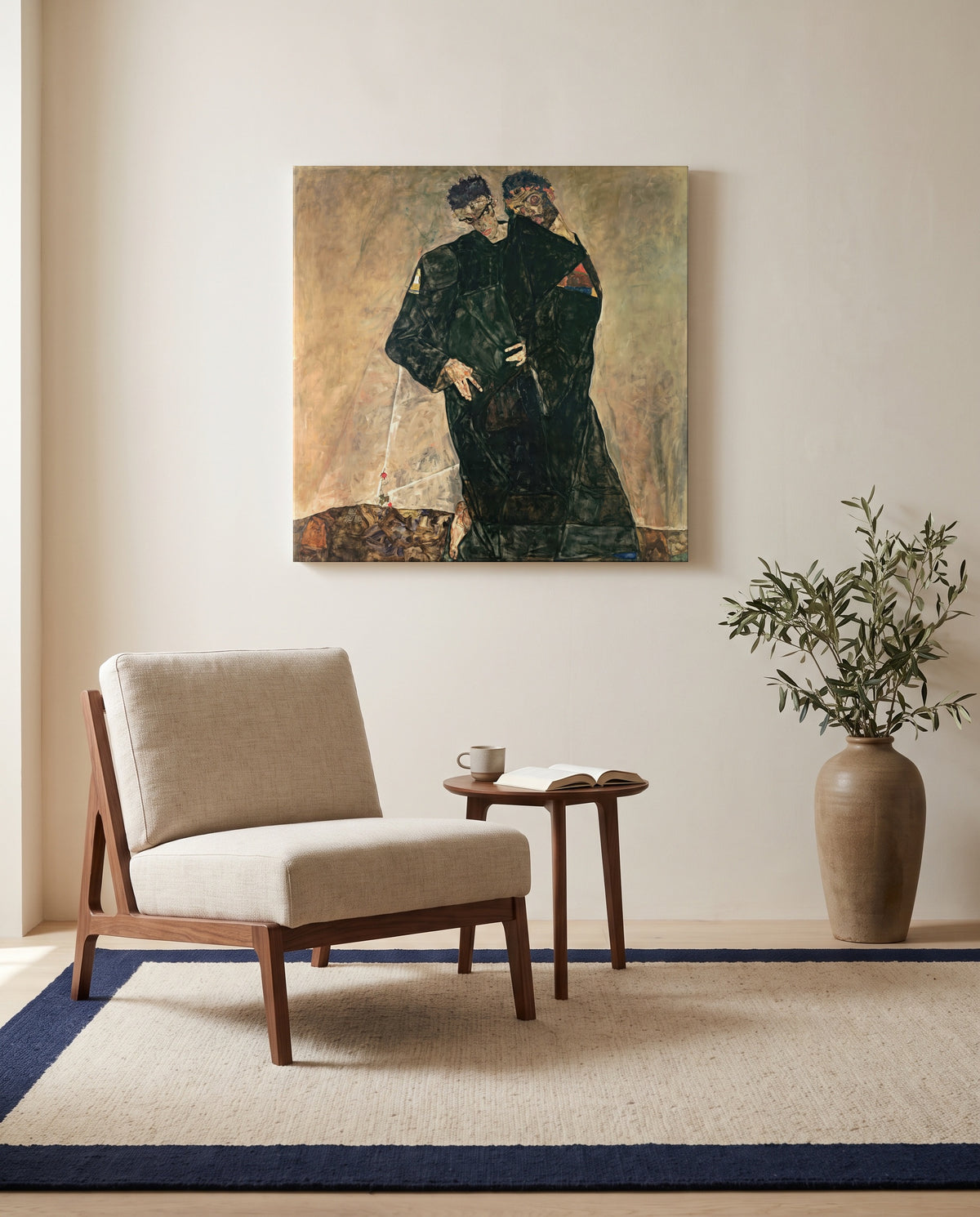 Hermits by Egon Schiele as a stretched canvas above a linen lounge chair in a reading corner