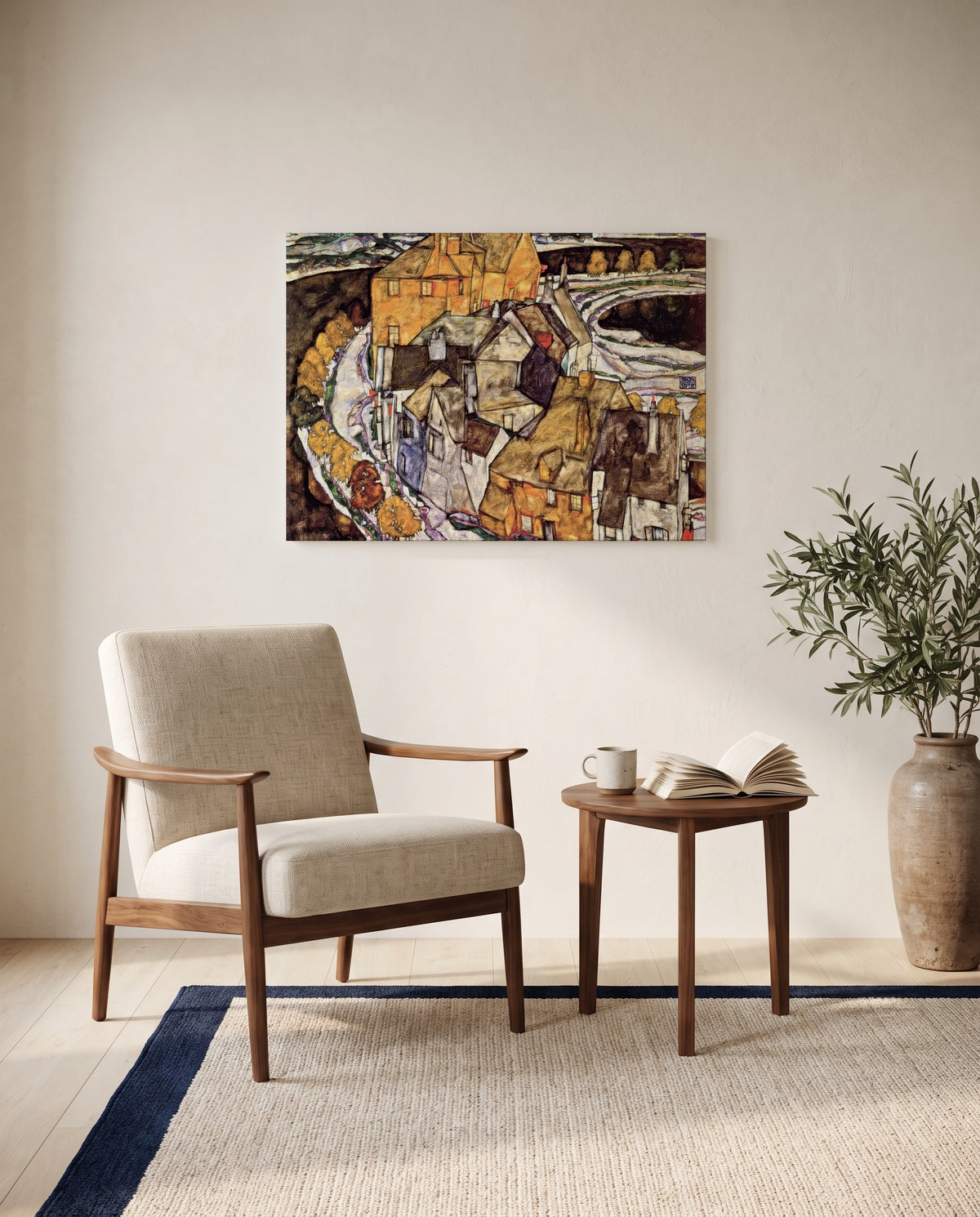 Island Town by Egon Schiele as a stretched canvas above a linen lounge chair in a reading corner