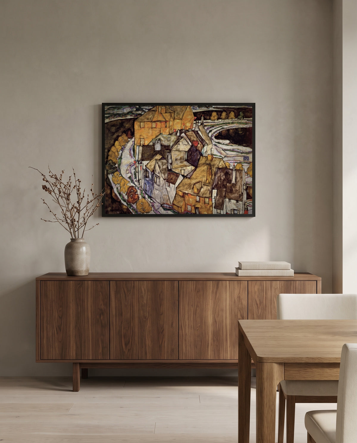 Island Town by Egon Schiele in a black frame above a walnut sideboard in a dining room