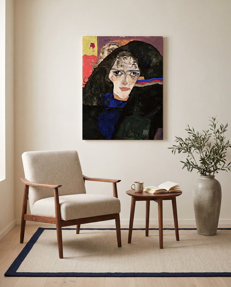 Mourning Woman by Egon Schiele as a stretched canvas above a linen lounge chair in a reading corner
