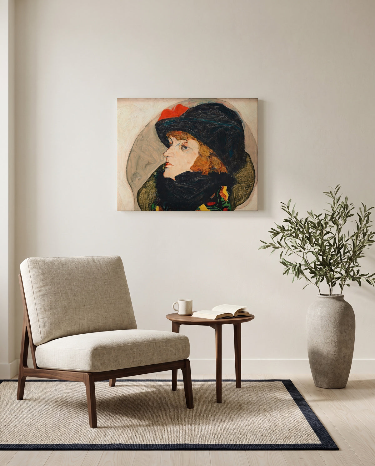 Portrait of Ida Roessler by Egon Schiele as a stretched canvas above a linen lounge chair in a reading corner