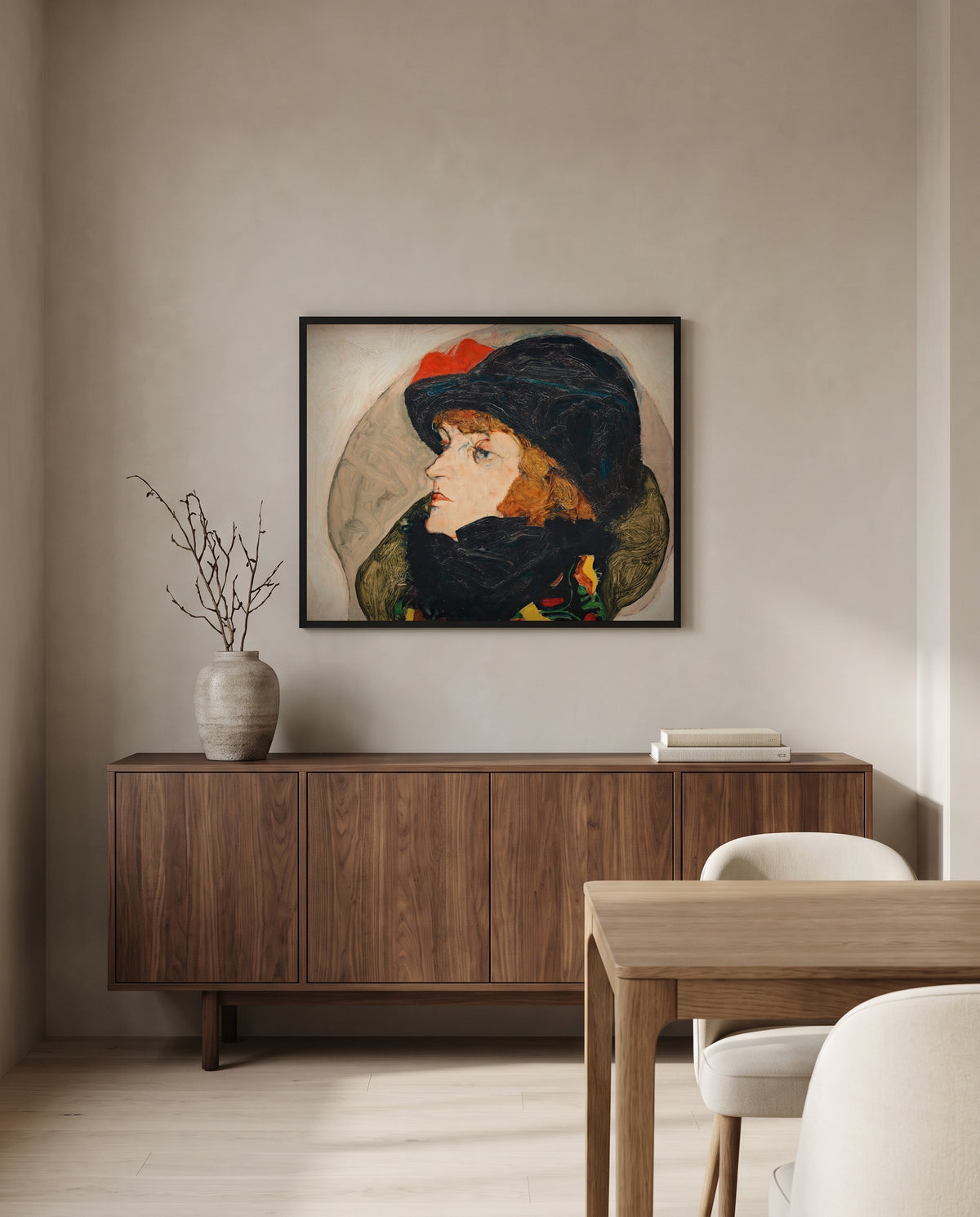 Portrait of Ida Roessler by Egon Schiele in a black frame above a walnut sideboard in a dining room