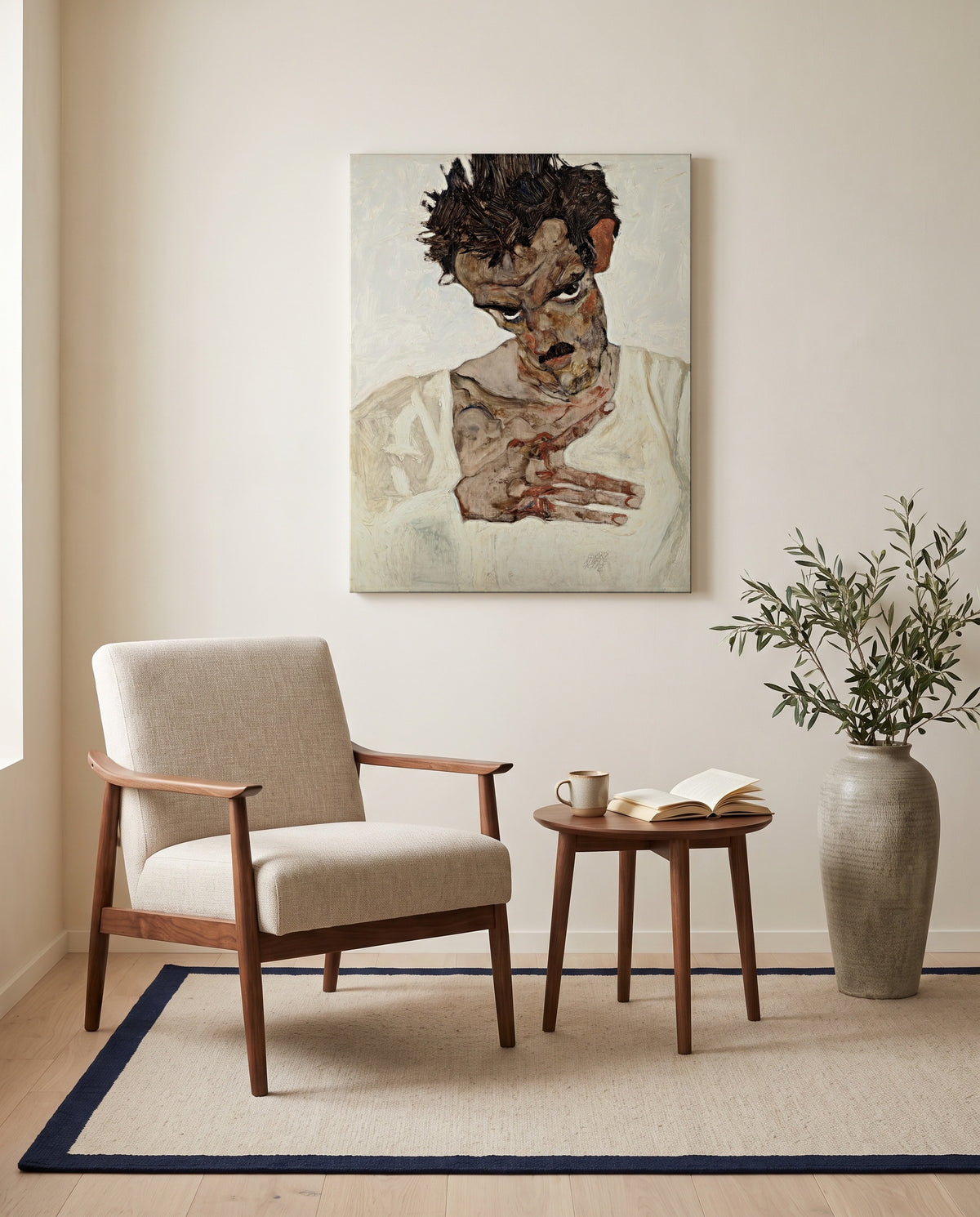 Self-Portrait, Lowered Head by Egon Schiele as a stretched canvas above a linen lounge chair in a reading corner