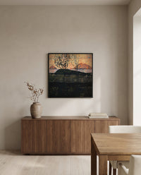 Setting Sun by Egon Schiele in a black frame above a walnut sideboard in a dining room