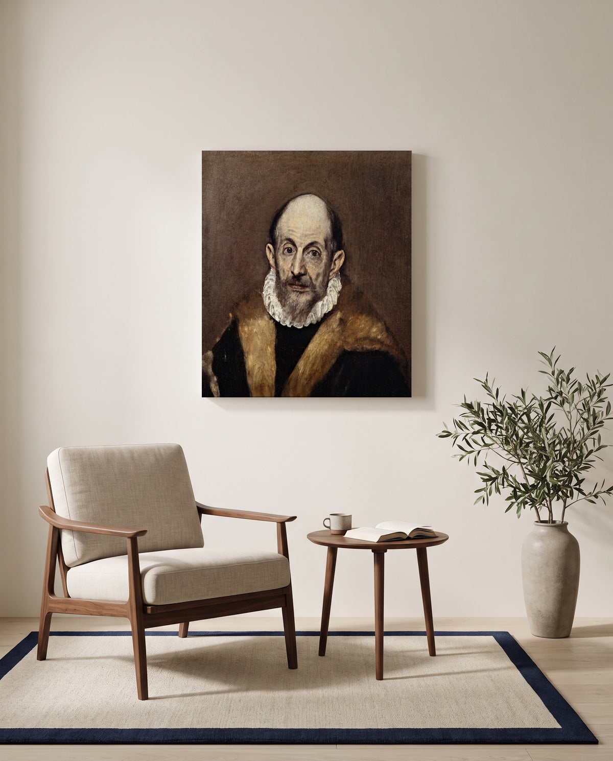 Portrait of an Old Man by El Greco as a stretched canvas above a linen lounge chair in a reading corner