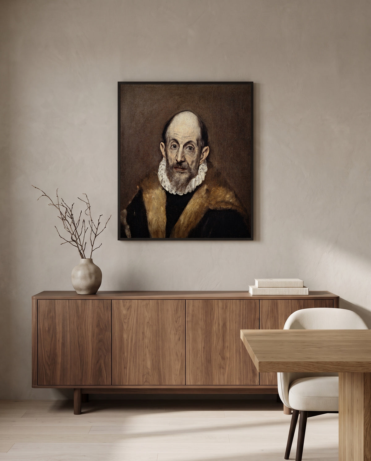 Portrait of an Old Man by El Greco in a black frame above a walnut sideboard in a dining room