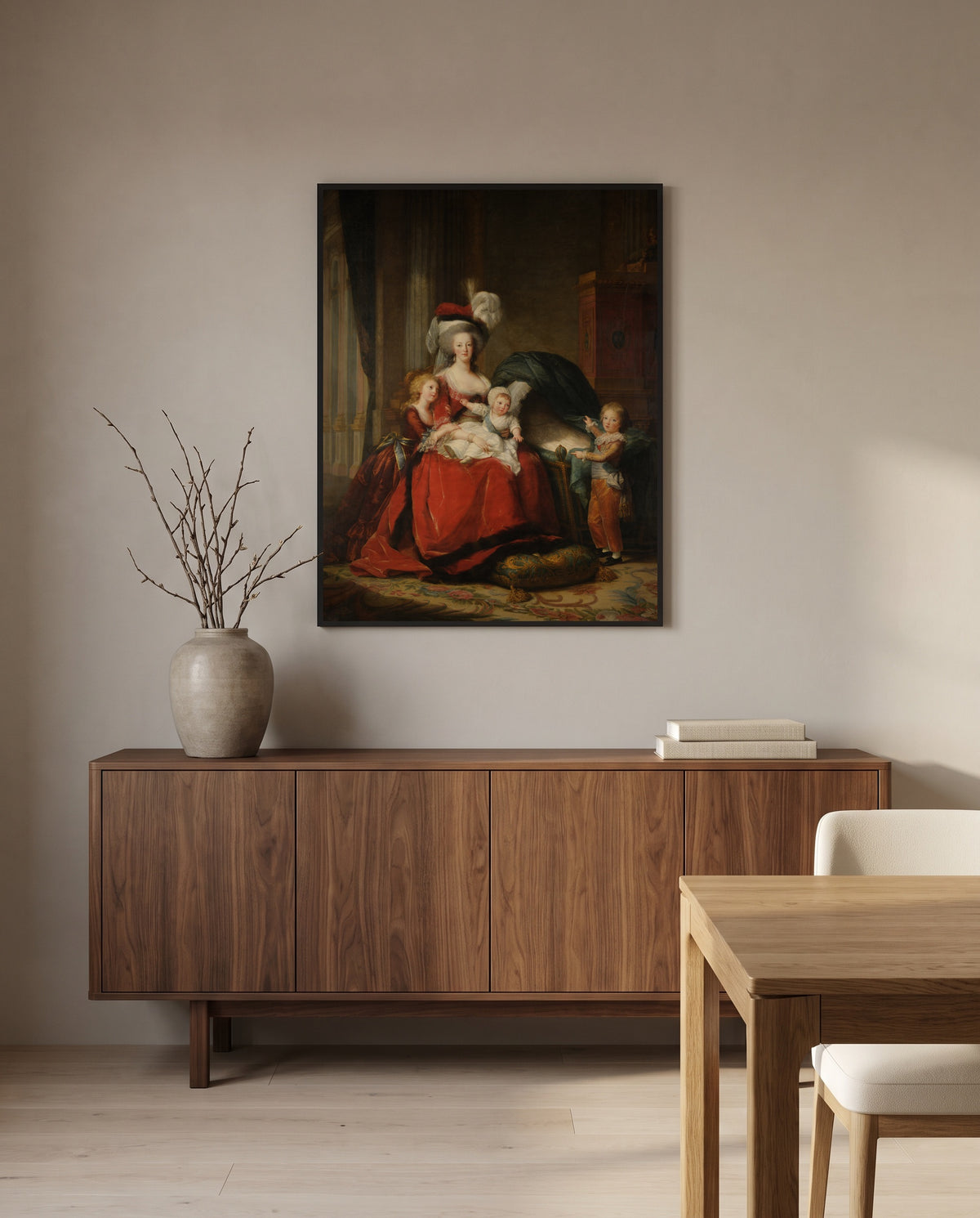 Marie Antoinette and Children by Élisabeth Vigée Le Brun in a black frame above a walnut sideboard in a dining room