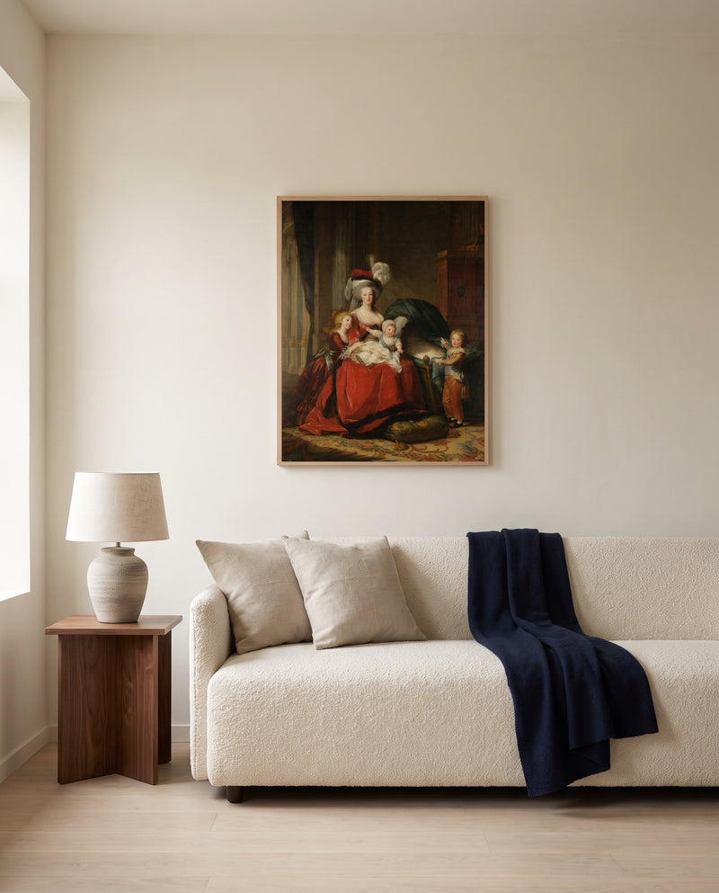 Marie Antoinette and Children by Élisabeth Vigée Le Brun framed in natural oak above a cream sofa in a warm living room