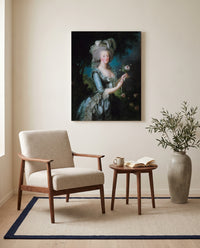 Marie Antoinette with a Rose by Élisabeth Vigée Le Brun as a stretched canvas above a linen lounge chair in a reading corner
