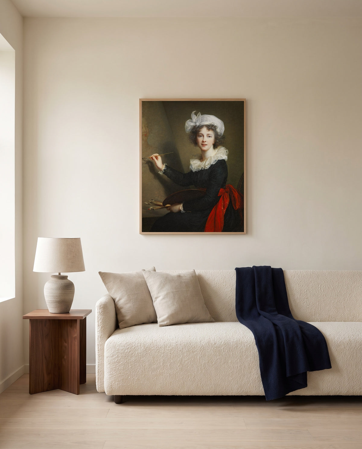 Self-Portrait, Uffizi by Élisabeth Vigée Le Brun framed in natural oak above a cream sofa in a warm living room