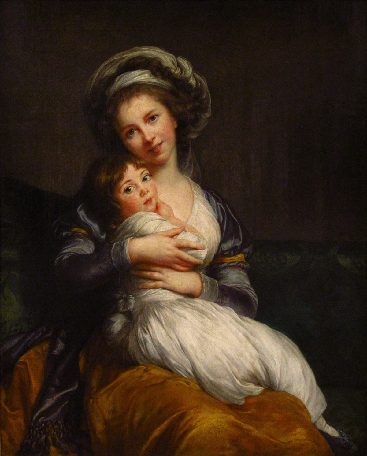 Self-portrait with her daughter by Vigée Le Brun: the painter in a turban and gold shawl hugging her little girl in white