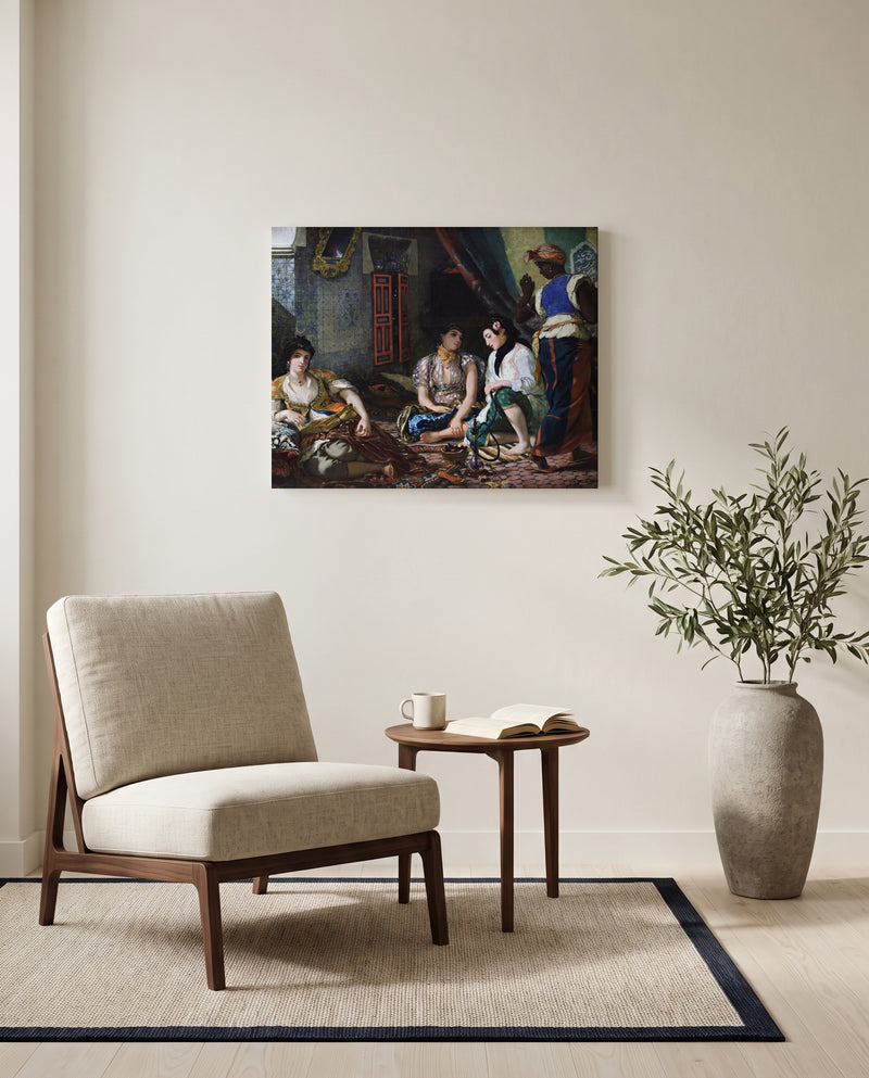 Women of Algiers by Eugène Delacroix as a stretched canvas above a linen lounge chair in a reading corner