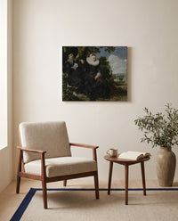 Isaac Massa and Beatrix by Frans Hals as a stretched canvas above a linen lounge chair in a reading corner