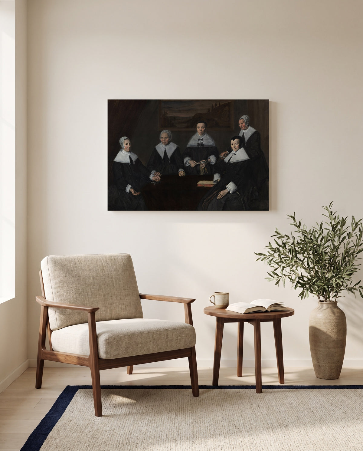 The Regentesses by Frans Hals as a stretched canvas above a linen lounge chair in a reading corner