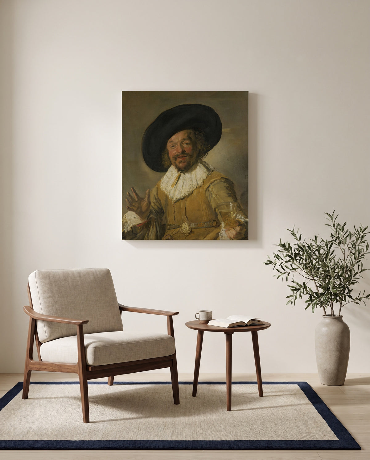 The Merry Drinker by Frans Hals as a stretched canvas above a linen lounge chair in a reading corner