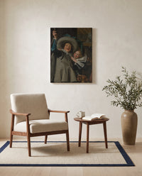 Young Man and Woman by Frans Hals as a stretched canvas above a linen lounge chair in a reading corner