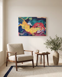 Cows, Red, Green, Yellow by Franz Marc as a stretched canvas above a linen lounge chair in a reading corner