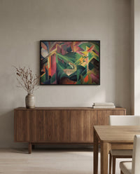 Deer in a Monastery Garden by Franz Marc in a black frame above a walnut sideboard in a dining room