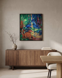 Deer in the Forest II by Franz Marc in a black frame above a walnut sideboard in a dining room