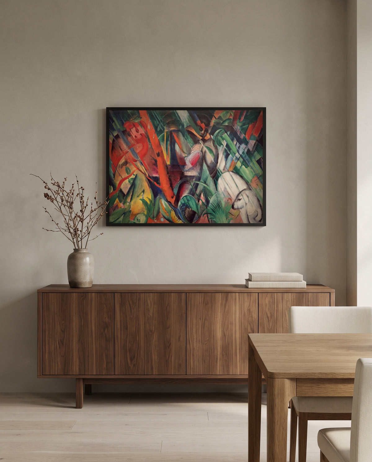 In the Rain by Franz Marc in a black frame above a walnut sideboard in a dining room