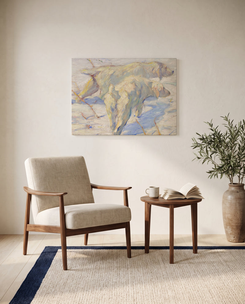Siberian Dogs in the Snow by Franz Marc as a stretched canvas above a linen lounge chair in a reading corner