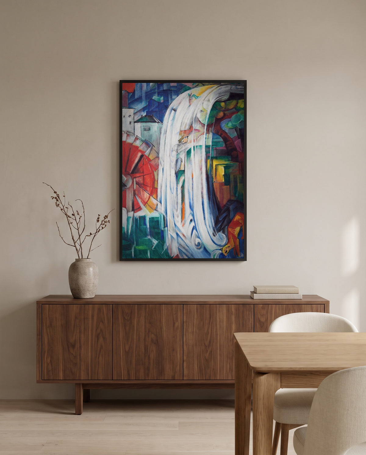 The Bewitched Mill by Franz Marc in a black frame above a walnut sideboard in a dining room