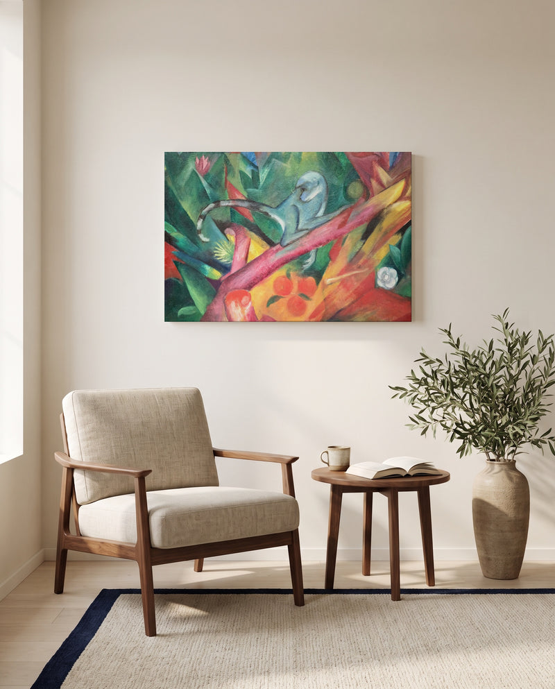 The Little Monkey by Franz Marc as a stretched canvas above a linen lounge chair in a reading corner