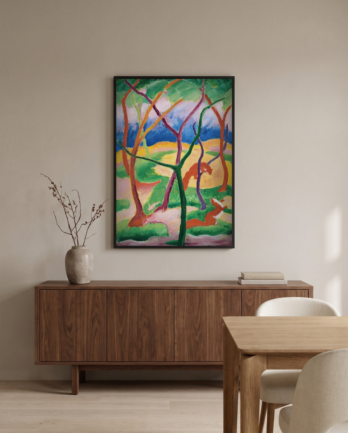 Weasels at Play by Franz Marc in a black frame above a walnut sideboard in a dining room
