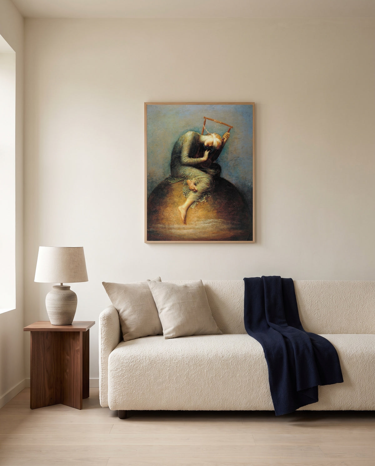 Hope by George Frederic Watts framed in natural oak above a cream sofa in a warm living room