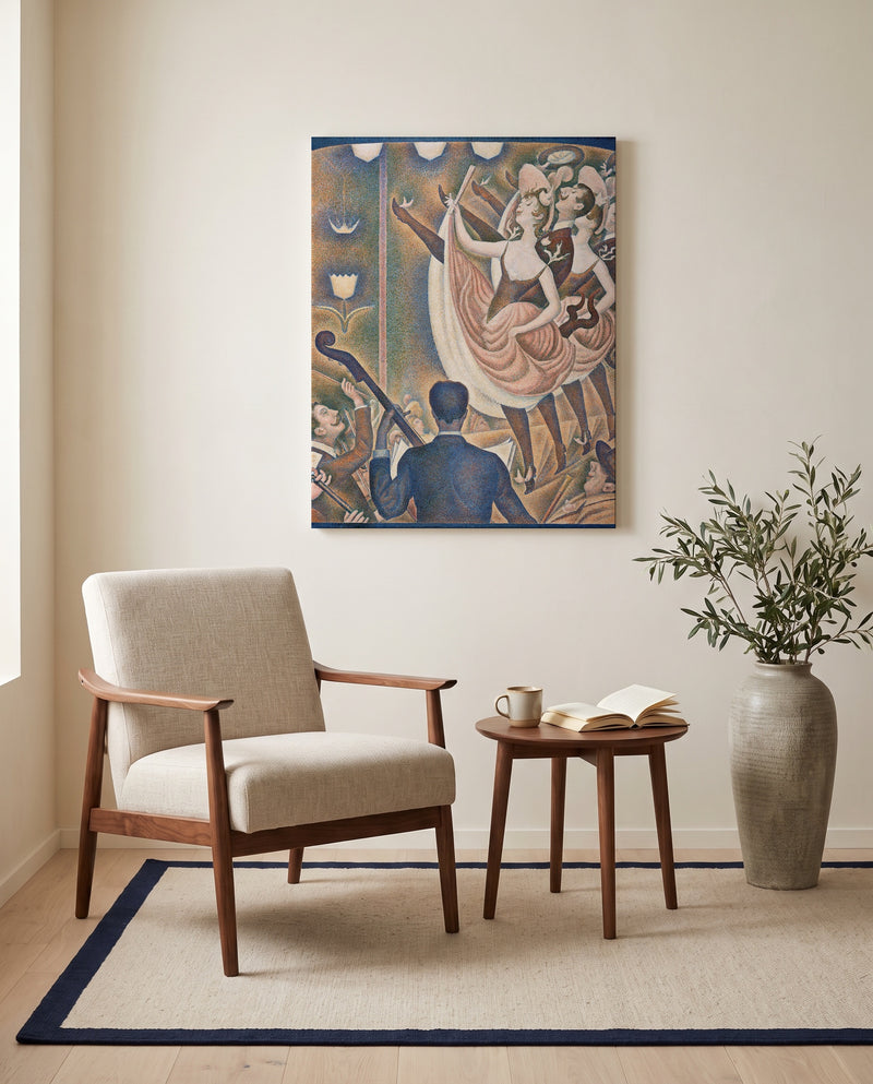 Le Chahut by Georges Seurat as a stretched canvas above a linen lounge chair in a reading corner
