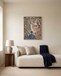 Le Chahut by Georges Seurat framed in natural oak above a cream sofa in a warm living room