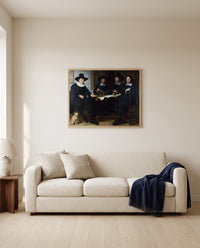 Four Guild Officers by Gerbrand van den Eeckhout framed in natural oak above a cream sofa in a warm living room