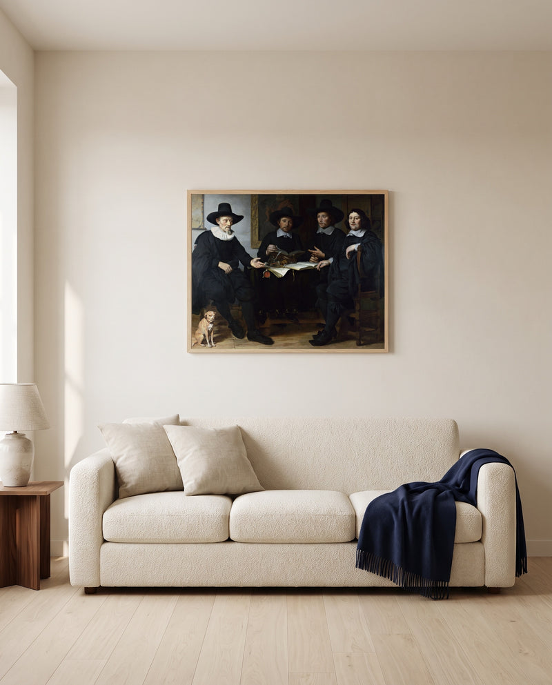 Four Guild Officers by Gerbrand van den Eeckhout framed in natural oak above a cream sofa in a warm living room