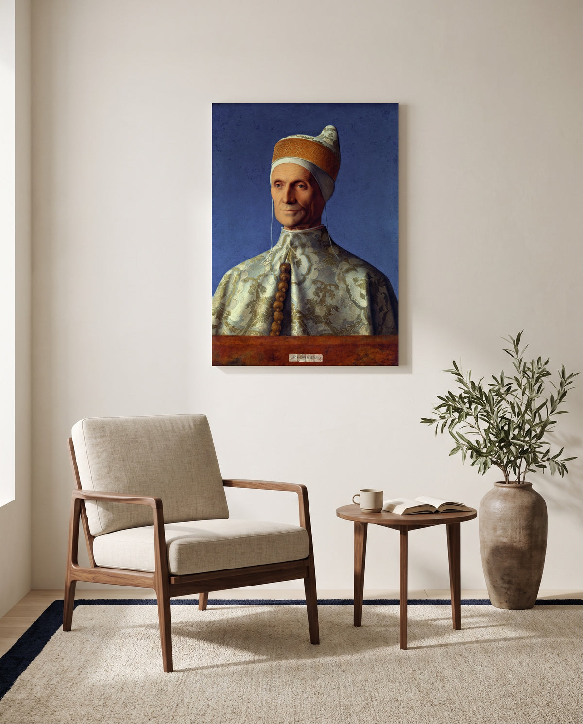 Doge Leonardo Loredan by Giovanni Bellini as a stretched canvas above a linen lounge chair in a reading corner